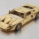 Illustration for article titled This Tiny 18-Karat Gold Ford GT Model Car Will Only Cost You About $40,000